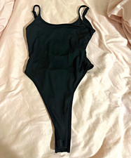 Women s Black Solid One Piece Bodysuit Strap Accent One Size