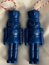 2 DARK BLUE NUTCRACKER CHRISTMAS ORNAMENTS; RESIN/PLASTIC, RED  WHITE CORDS