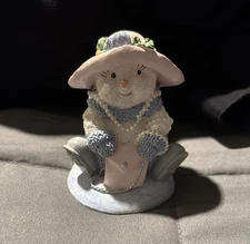 The Encore Group 2000 Playing Dress Up Snowman Figurine.