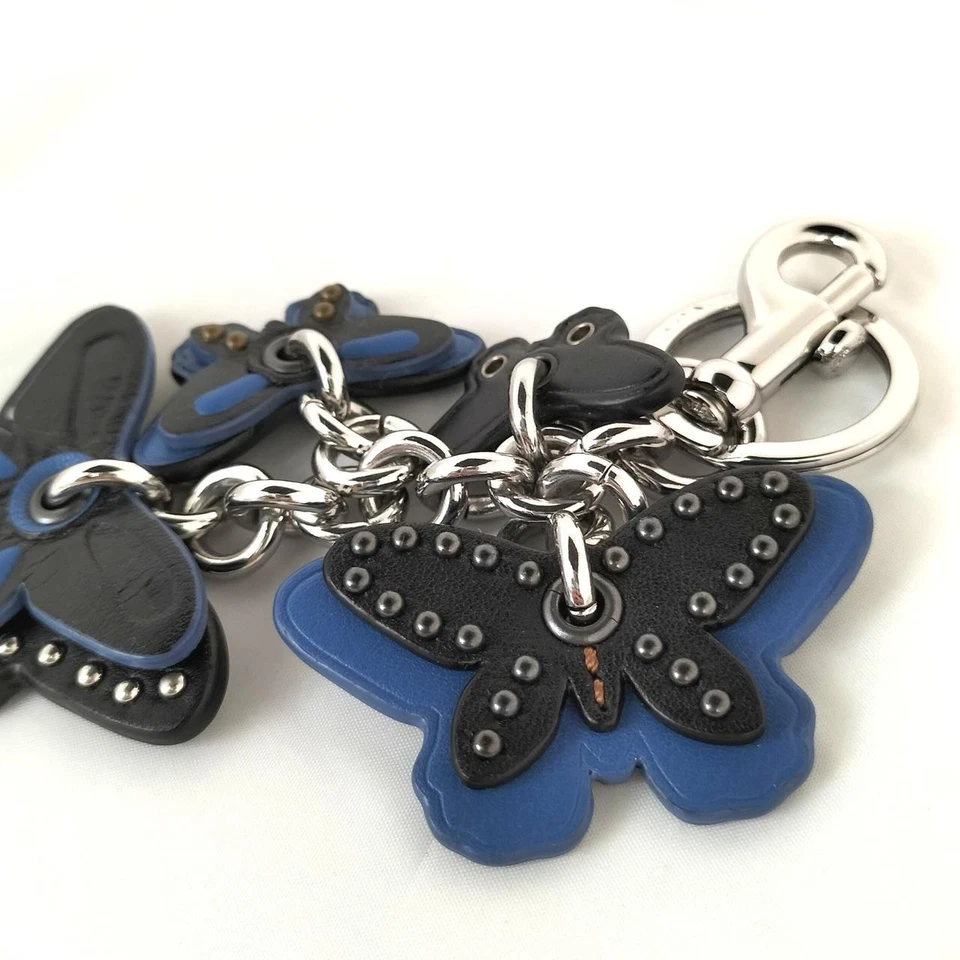 COACH Dije Mariposa Cuero Azul Llavero Dije Mariposa Silueta Foto 3 de 4