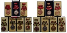 7x DDR NVA Medaillen f&uuml;r treue Dienste NVA und Verdienst Medaillen + Spange