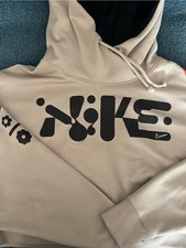 Nike Beige Crop Hoodie with Black Graphic Logo