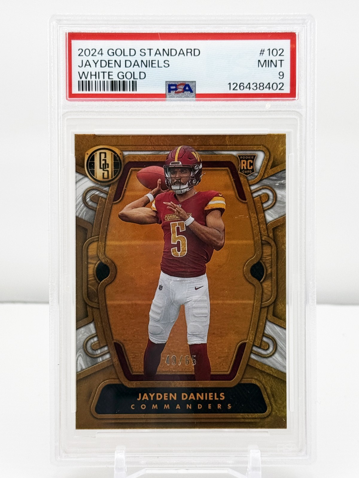 2024 Gold Standard Rookie Jayden Daniels #102 White Gold /65 (RC)