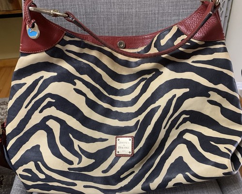 Dooney & Bourke Vintage Large Travel Carry On Bag. Zebra Pattern, Leather Strap - Image 1