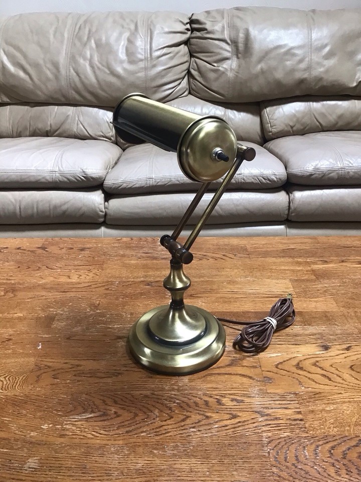 A genuine vintage piano-key banker's lamp in antique brass — the kind of atmospheric desk piece that makes your whole setup look like a 1920s detective's office.