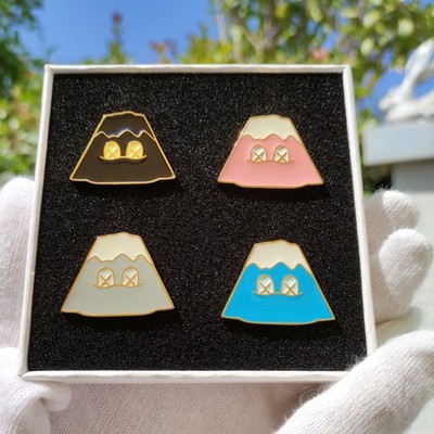 KAWS   HOLIDAY JAPAN Mount Fuji Pin Set (Set of 4)