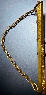 Tie clasp: antique gold plated 2.5" long lots of spring in it (Lot #68)