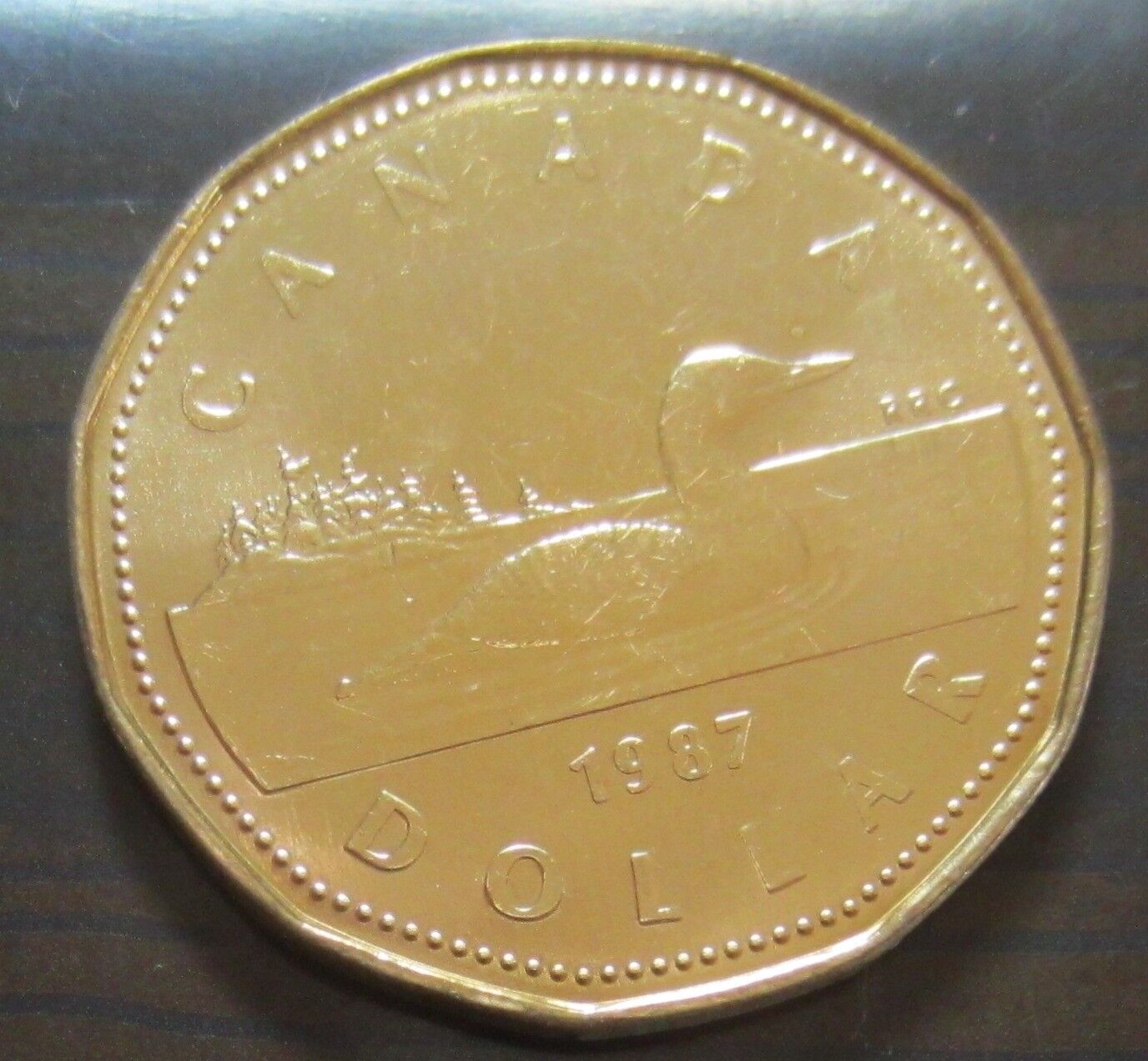 1987 Canada One Dollar Coin. (UNC. Canadian Loonie 1 $)