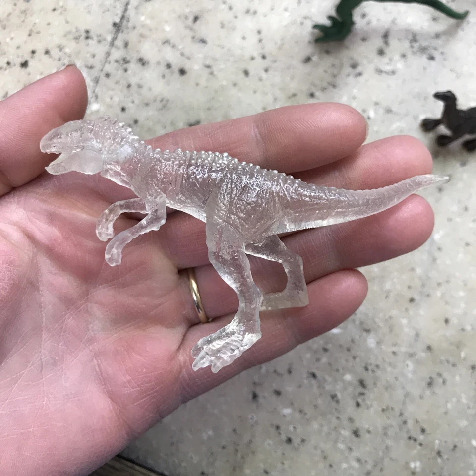 Lote de figuras mini bolsa ciega de dinosaurios de acción Jurassic World - T Rex - transparente - Mattel Foto 3 de 4