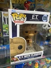 Funko POP! Movies: ET With Flowers #1255 Box Ships With Soft Protector