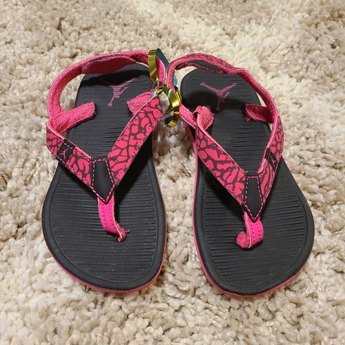 pink Air Jordan flip flops 