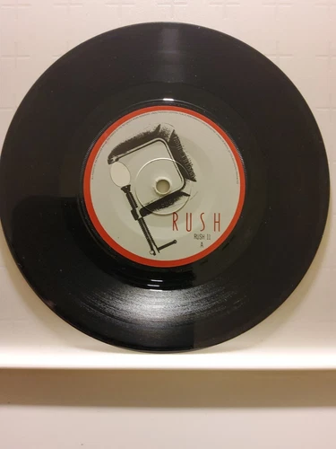 RUSH, THE BODY ELECTRIC , 7” VINYL ,FREE DOMESTIC P&P NEAR MINT/ Ex