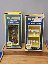 2 AHM Accessories Kits: HO Scale, Telephone Poles, Traffic Signs. Read.