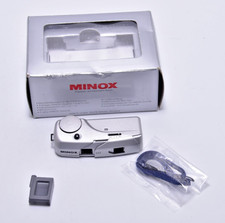 MINOX MX WITH ND FILTER AND WRIST STRAP IOB