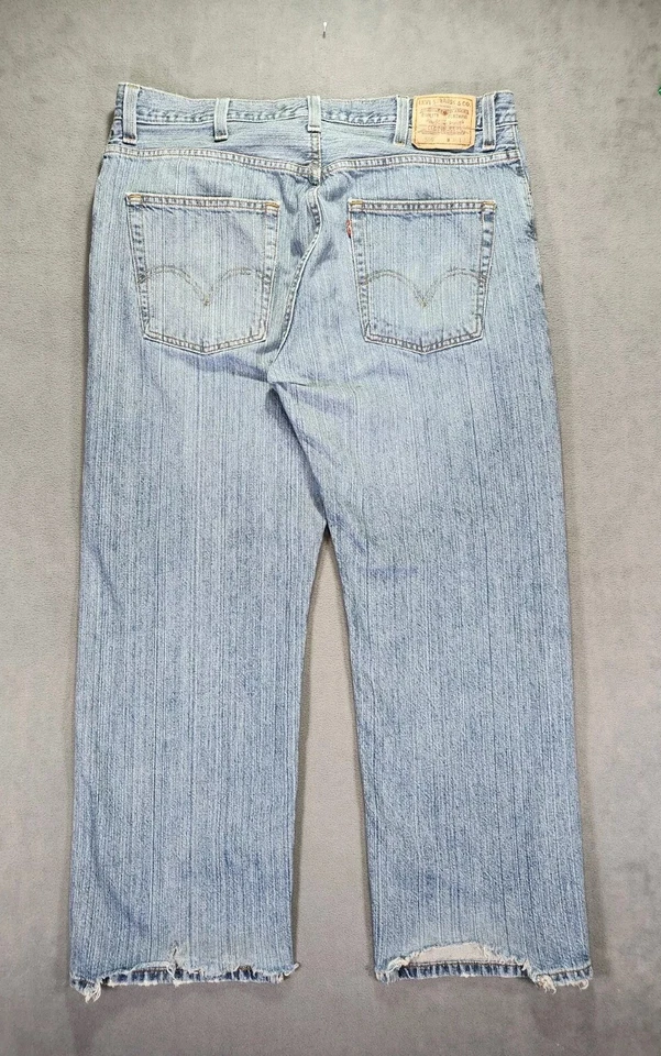 Jeans rectos sueltos vintage Levis para hombre 569 azules 38x32 dobladillo deshilachado lavado claro Y2K Foto 2 de 4