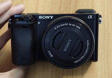 Sony Alpha A6000 Mirrorless Digital Camera w/16-50mm Lens English Language Black