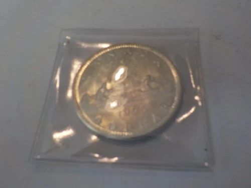 1965   SILVER    Dollar   Canadaian       .800 silver