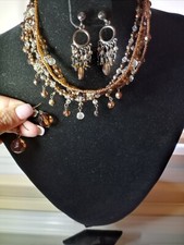 BROWN BEADED CHOKER NECKLACE WITH 2 SETS OF PIERCED EARRINGS