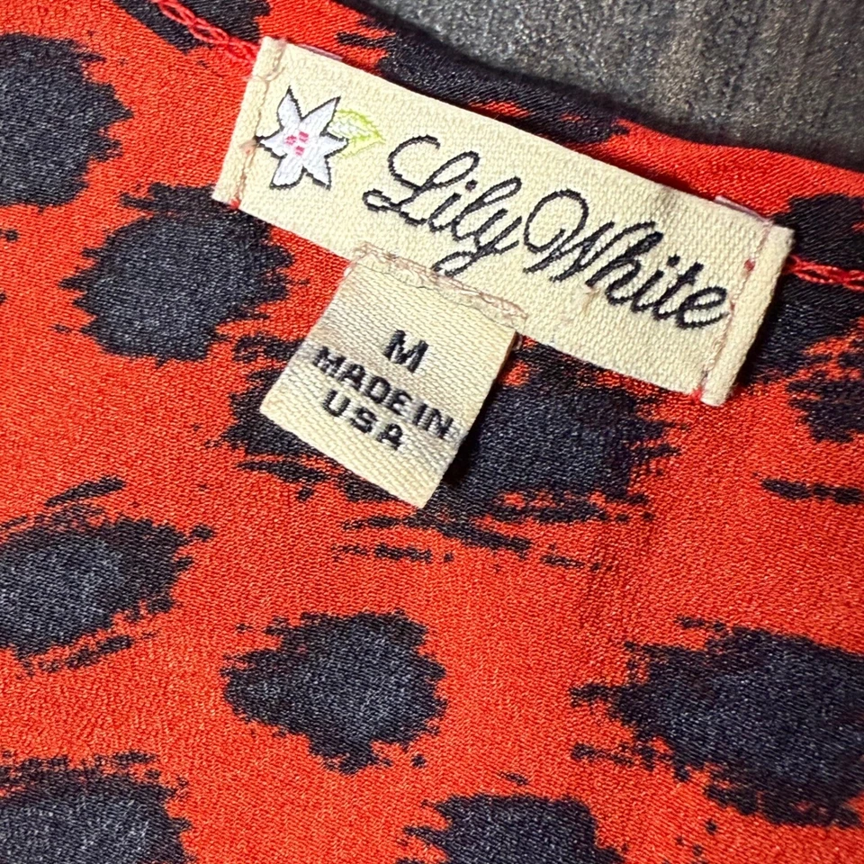 Camiseta sin mangas Lily blanca espalda cruzada estampado guepardo sin mangas informal roja M Foto 4 de 4