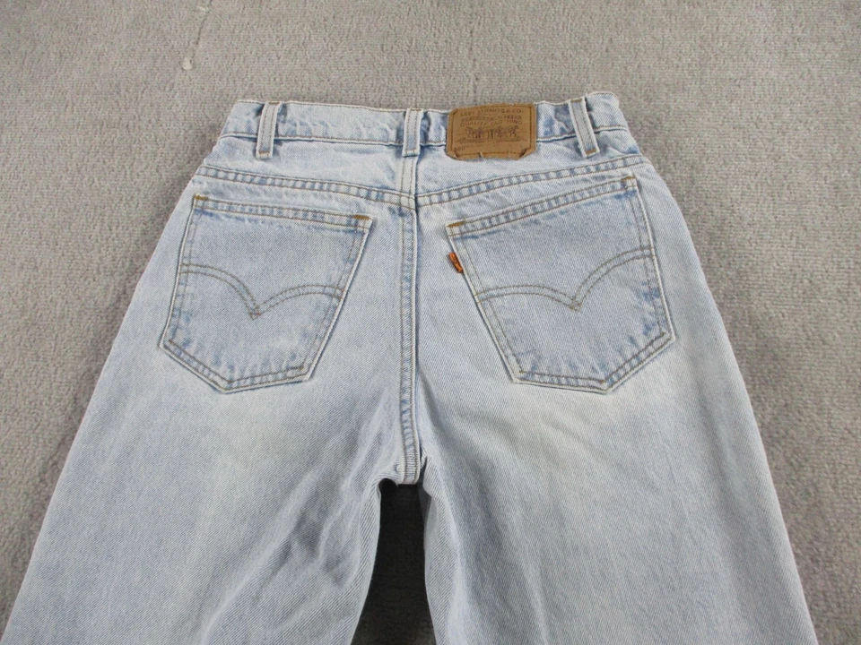 Jeans Levis 550 vintage para hombre 28x28 lavado claro calce relajado cónico lengüeta naranja años 90 Foto 4 de 4