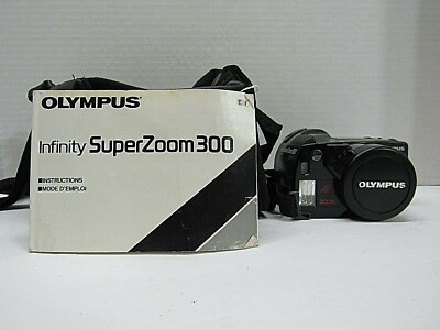 Olympus Infinity Super Zoom 300 Camera.  With Instruction Manual and Carry Case.
