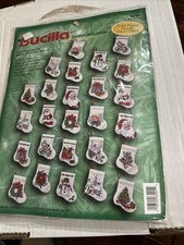 Bucilla 1998 Counted Cross Stitch Kit Set of 26 Christmas Stocking Ornaments NIP