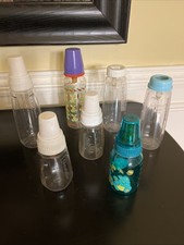 vintage Gerber baby bottles 7 w/nipples caps 9oz 5oz 5 new/2 mint cond