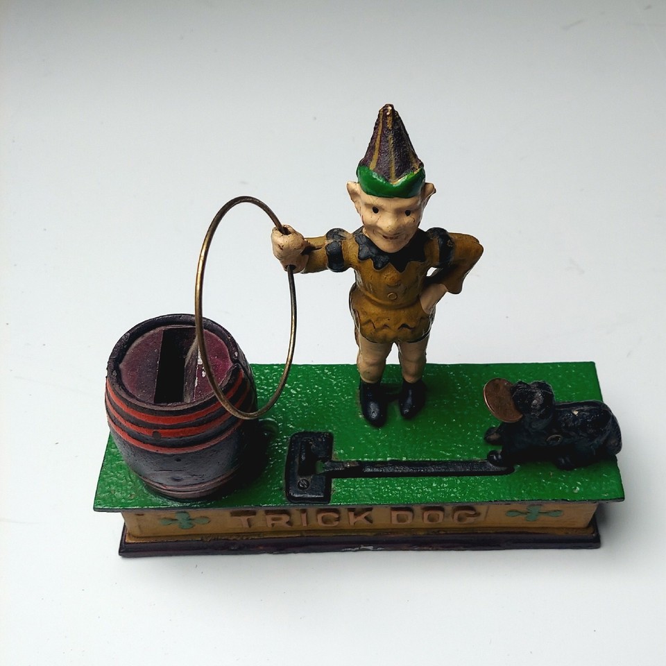 Antique Cast Iron Mechanical Coin Bank Trick dog Jumps Through Hoop