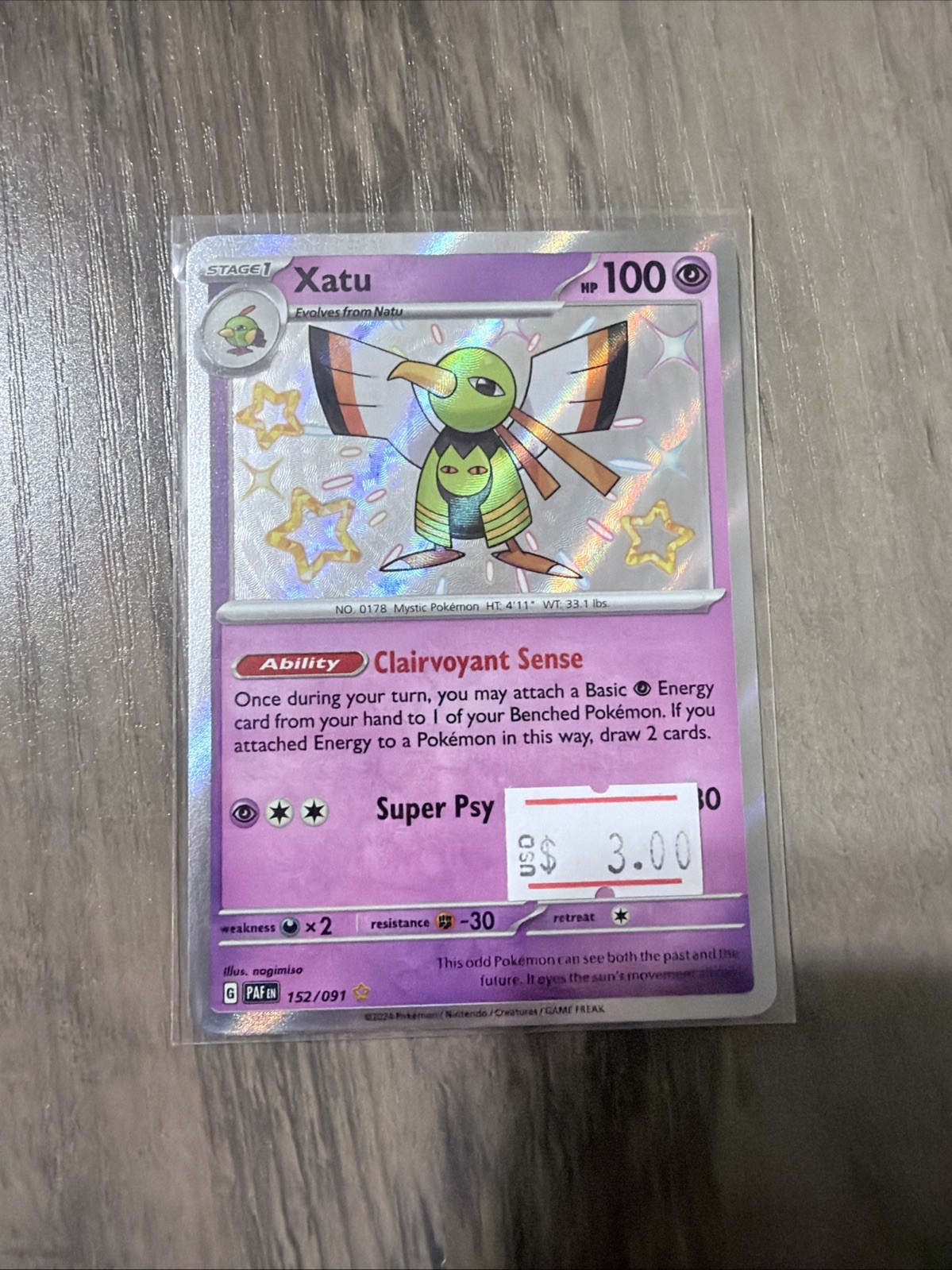 Xatu - 152/091 - SV: Paldean Fates NM
