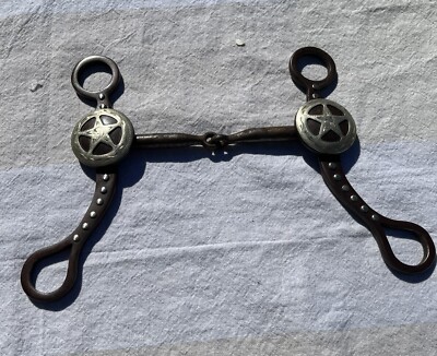 Used Western Bit, Mid-shank dark iron snaffle w/Texas star and studded detail