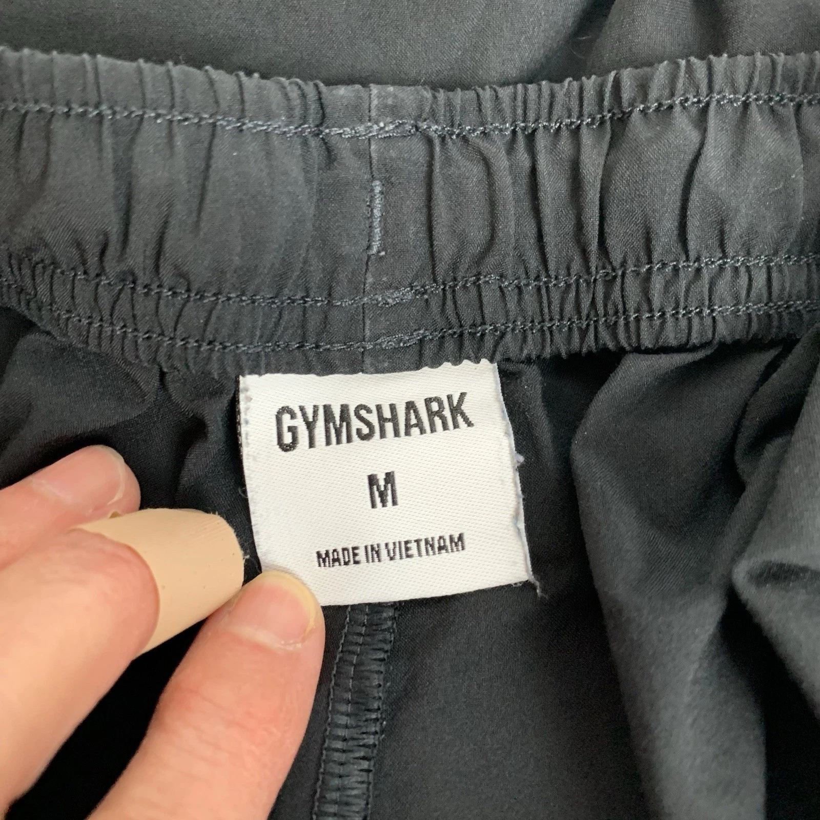 gymshark training loose fit crest logo pre owned shorts