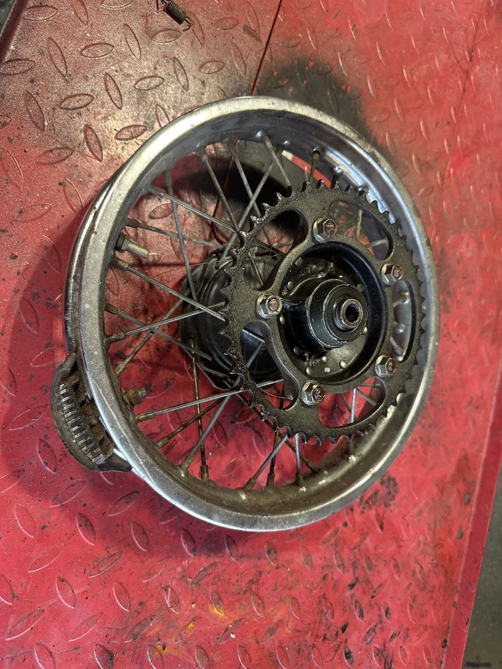 Llanta trasera plateada Kawasaki KX60 1983-2003 12X1,60 Suzuki 2003 RM60 ACS431 Foto 2 de 4