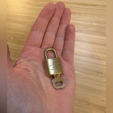 Louis Vuitton gold tone Padlock with Key