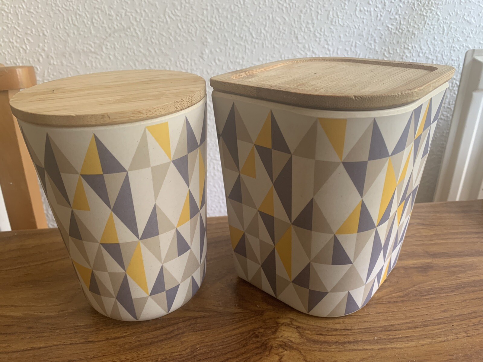 Two Geometric Design Bamboo Storage Jars. Grey/ Mustard. 15cm Tall