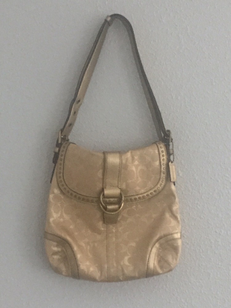 Gold Coach handbags used