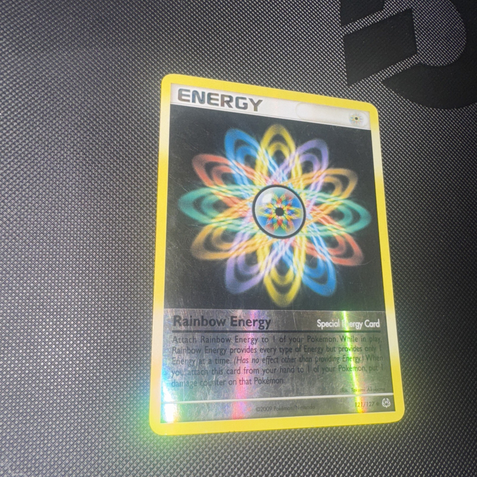Rainbow Energy Reverse Holo Pokemon Card Platinum 121/127  