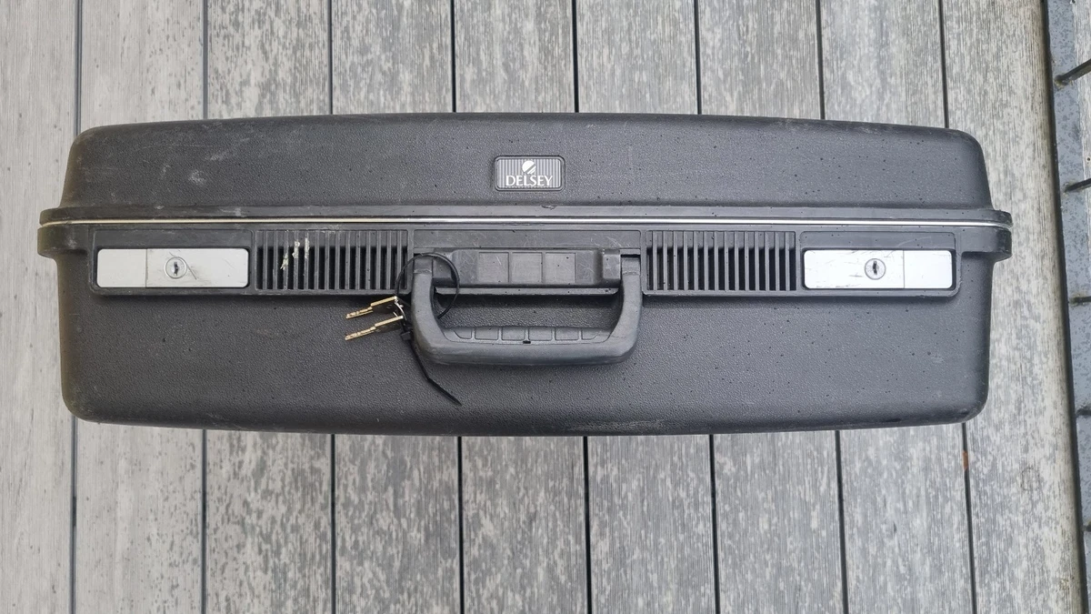 Reisekoffer Delsey schwarz 65 x 50 cm x 20 cm tiefe auf 2 Rollen mit Griff