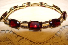 VINTAGE MONET BLOOD RED GOLD TONE BRACELET