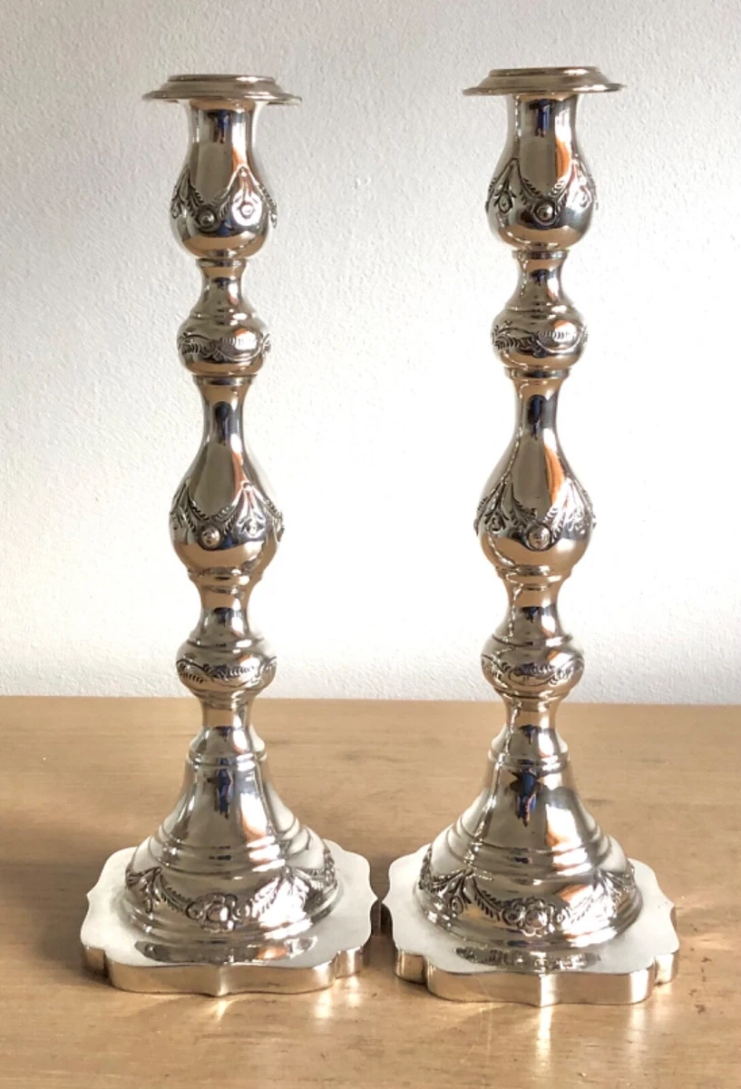 Solid silver shop candlesticks