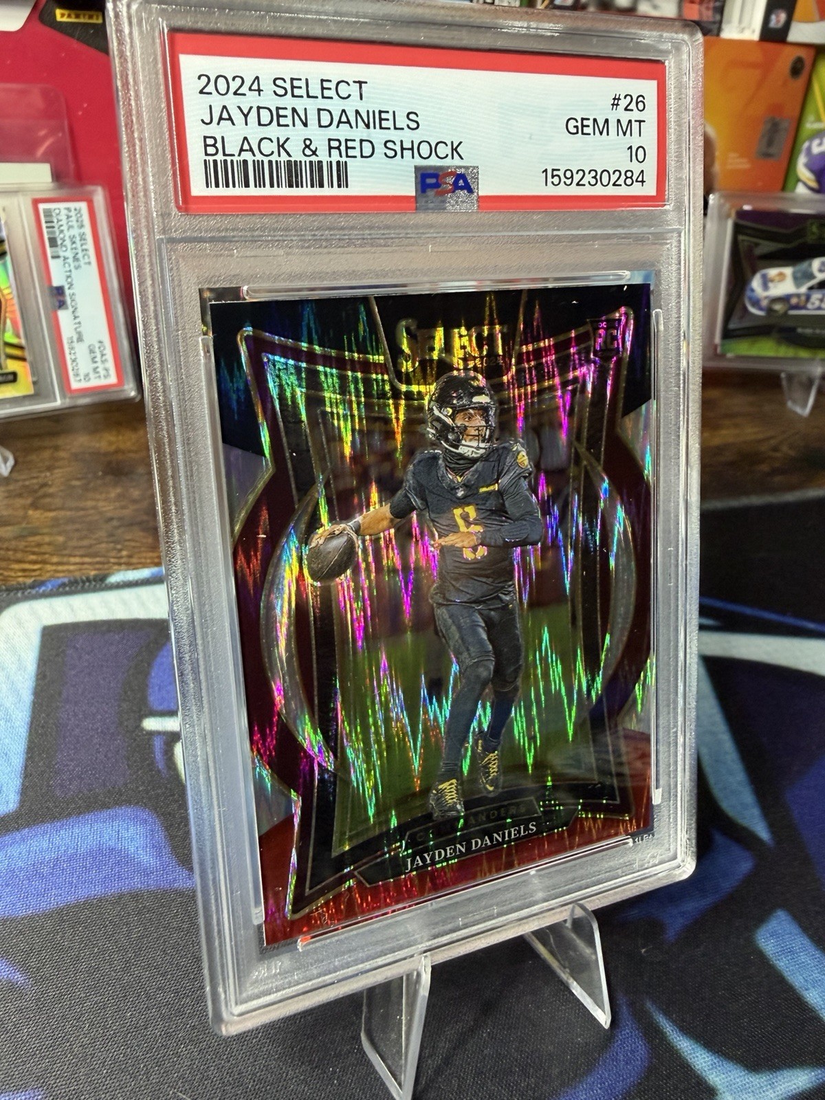 2024 Panini Select Concourse Jayden Daniels #26 Black & Red Shock Prizm PSA 10 view 3
