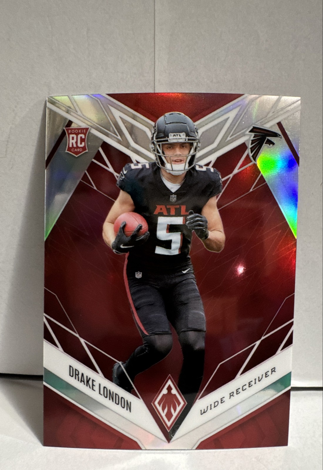 2022 Panini Phoenix - Rookies Drake London #107 Red /250 (RC)