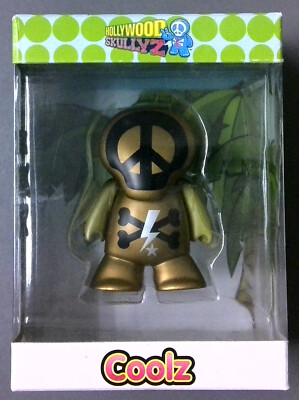 Hollywood Skullyz 2.5'' Vinyl Figures COOLZ (in gold) - Tabloid Hero 2011