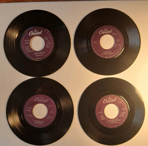 4 different Beatles 45rpm records, best condition possible for being unsealed