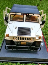 White Meisto White Soft Top Hummer on display tray
