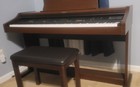 The Technics SX-PR53 is a vintage, 88-key weighted digital ensemble piano. — photo 6