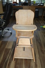 Antique Highchair that converts into a desk. My wife started refinishing it.....