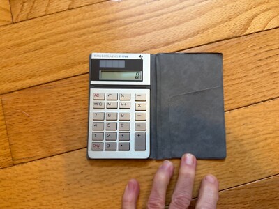 Vintage Texas Instruments TI-1768 Mini Compact Pocket Solar Calculator Works