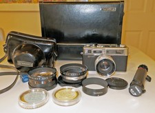 Yashica Electro 35 w/ tele wide angle filters,shade, tripod Yashica case MINT-