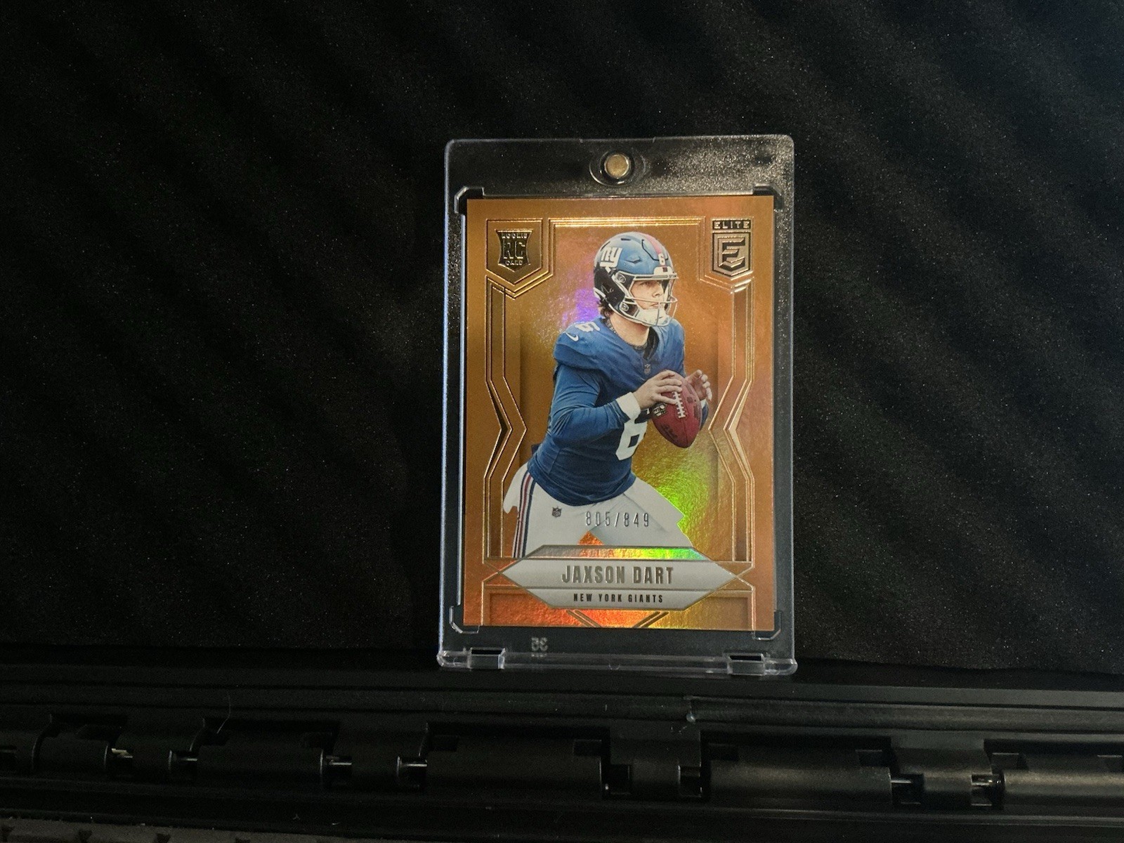 2025 Panini Donruss Elite - Rookies Jaxson Dart #103 Status Metallic Orange /849