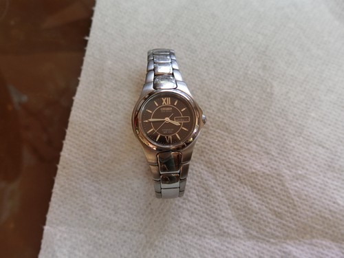 CITIZEN Eco-Drive 25mm Titanium Women’s Watch Day & Date, WR100, Solar powered.